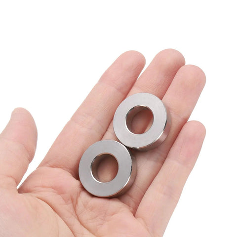 10 Pack Stainless Steel Spacers Half Inch Bore One Inch OD Quarter Inch Length for M12 Screws Bolts and Rods Plain Finish Built Tough Rust Resistant Round Metal Bushings for DIY Projects, two spacers in hand