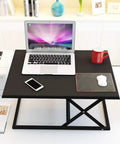 Slick Foldable Office Desk With Adjustable Height Mobile Workbench For Chill Home Office Or Dope Gaming Setup with laptop, black top.