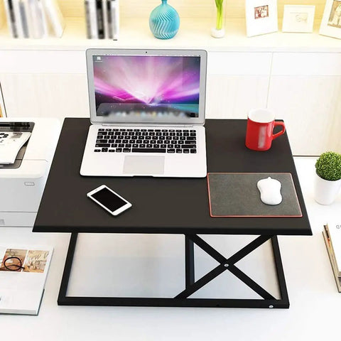 Slick Foldable Office Desk With Adjustable Height Mobile Workbench For Chill Home Office Or Dope Gaming Setup with laptop, black top.