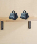Ultra Strong Black L Brackets Wall Mounts Rock Solid Corner Shelf Supports Rust Proof Iron Braces Quick Setup Kit For Diy Floating Shelves And Home Storage Goals with 15kg weights on a wooden shelf.