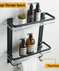Heavy Duty Lavatory Glass Bathroom Shelf With Huge Storage Space Two Tier Tempered Glass Shower Shelves With Towel Bar Wall Mounted Matte Black Aluminum Finish 15 By 5 Inches displaying bottles and towel