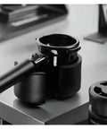 Adjustable Aluminum Portafilter Tamping Base With Durable 51 53 58mm Stand For Quick Shot Prep Solid Home Barista Gear on a countertop.