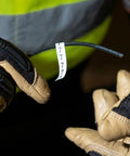 Wire Marker Book For Cable Management And Electric Panel Organization With Numbered 1 To 48 Labels, gloved hands applying label 7