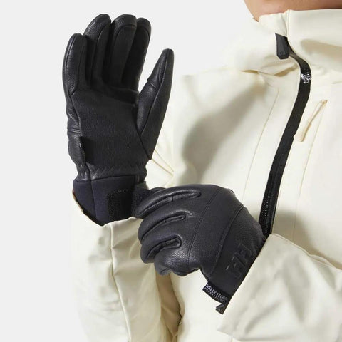 Person wearing Womens Alphelia Waterproof Leather Gloves With Helly Tech Professional Breathable Seam Sealed Design in cold weather attire.