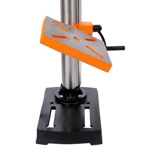 Compact 10 Inch Benchtop Drill Press With Enclosed Class I Laser Positioning System, Digital Meter Display, Variable Speed Control And Tilting Table. Close-up of tilt table with orange surface.