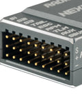 Close-up of Nexus-XR Helicopter Flight Controller With Integrated 2.4GHz ExpressLRS Receiver, showing gold pin connectors