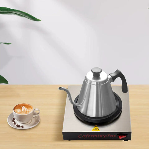 Professional Stainless Steel Coffee Warmer Plate, 80W Electric Mug Heater For Desk And Home on a wooden surface with a coffee cup.
