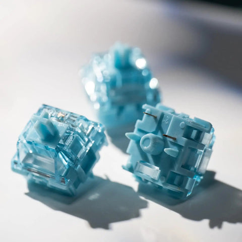 Close-up of V5 Creamy Blue 5 Pin 45gf Pre Lubed Tactile Keyboard Switches for Mechanical Gaming Keyboard, displaying smooth design.