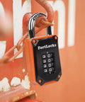 Beefy Heavy Duty Gym Locker Padlock With 4 Digit Combination Hardened Stainless Steel Body on orange metal surface