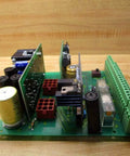Rock Solid C Power Supply LS 0248 C 029915 for electronics lab with green PCB, capacitors, and connectors, side view