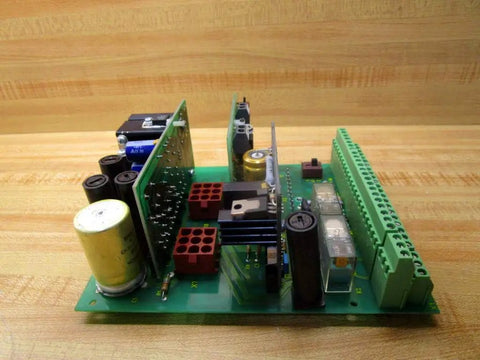 Rock Solid C Power Supply LS 0248 C 029915 for electronics lab with green PCB, capacitors, and connectors, side view