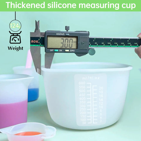 Ultimate Resin DIY Kit Silicone Measuring Cups Set with 600ml and 100ml Mixing Cups shown with caliper at 3mm thickness.