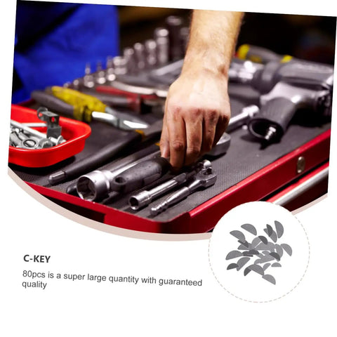 Hand selecting tools from red tray in 80 Piece Stainless Steel Woodruff Key Set For Pulleys And Driveshafts Handy Hardware Assortment