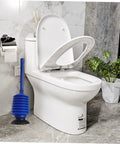 Heavy Hitter Two Piece Toilet Plunger Set With Grippy Handle To Kick Loose Stubborn Sink Clogs Using Rapid Air Surge For Smooth Bathroom Drain Clearing Zero Sweat Days beside a clean toilet.