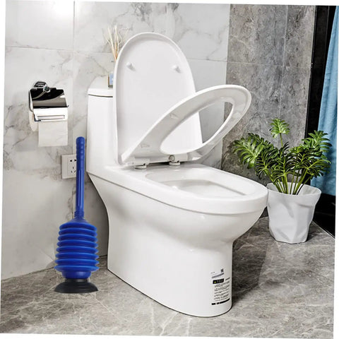 Heavy Hitter Two Piece Toilet Plunger Set With Grippy Handle To Kick Loose Stubborn Sink Clogs Using Rapid Air Surge For Smooth Bathroom Drain Clearing Zero Sweat Days beside a clean toilet.