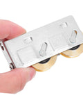 Rock Solid Heavy Duty Double Wheel Sliding Door Pulley Two Pack Stainless Steel Roller Kit, close-up of pulley with copper bearings.