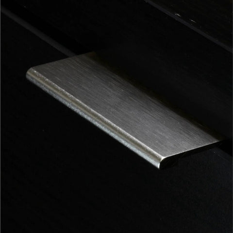 Close-up of brushed stainless steel finger edge pull handle installed on dark cabinet. Part of Finger Edge Pull Handle Set, 10 Pack.