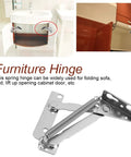 Stainless Steel Lift Hinge 80 Degree With Spring Mechanism for sofa beds and cabinet doors, shown attached to bathroom cabinet.