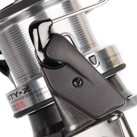 Close-up of Infinity X 5500 BR Fishing Reel With Smooth Drag System And Durable Aluminum Body showing spool and bail arm detail