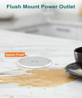 Flush mount pop up power outlet with wireless charging on kitchen countertop, splash proof next to spilled coffee.