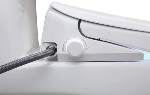 Top Shelf Elongated Bidet Toilet Seat In Crisp White showing control panel for water temperature settings and stainless steel nozzle.