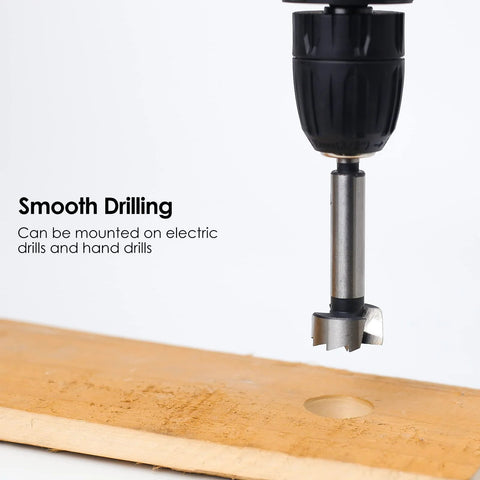 BAIDETS Forstner bit set, 8-piece steel drill bits mounted in a drill chuck over a wooden board with a hole