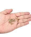 Hand holding Invisible Brass Barrel Hinges 12 Pack Concealed 15x4mm for DIY keepsake boxes, cabinets, copper material