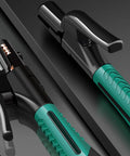 Close-up of welding electrode holder and ground clamp with green textured handles and copper contact jaws, 300A