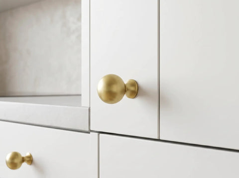 Top Shelf Brushed Gold Cabinet Knobs Six Pack For Modern Kitchen Drawers And Dressers Crafted From Solid Zinc Alloy Ridge Tough Construction Quick Install Mounting on white cabinet.