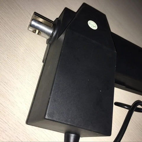 Heavy Duty 12V And 24V Linear Actuator With 20 Inch Stroke And 8000N Load, close-up of black casing and metal mount