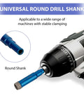 Built Like A Tank Heavy Duty Diamond Hole Saw Set With Razor Sharp Pilot Drill Bit For Porcelain Ceramic Tile Granite Marble And Brick An Eleven Piece Kit Ranging From One Quarter To Two Inches, showing a blue round drill shank attached to an electric drill.