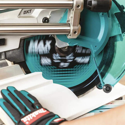 12 Inch 100 Tooth Carbide Tipped Miter Saw Blade for Max Efficiency in use cutting wood with gloved hand for safety