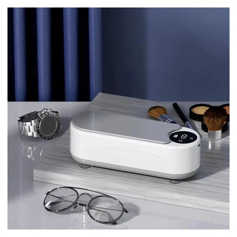 This Slick Little Ultrasonic Cleaner Machine Packs A Serious Punch With A Roomy 300 ML Tank for cleaning glasses and makeup brushes.