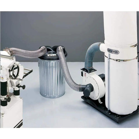 Top Tier Cyclone Dust Collection Separator Fits 20 To 21 Inch 30 Gallon Trash Cans in a shop setup with hoses attached.