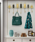 Tough As Nails Nordic Wall Hooks With Zero Drill Install For Heavy Duty Coat And Key Storage In Entryway Bedroom Bath, featuring sleek design and bags.