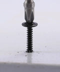 Top Tier Number 8 By Half Inch Sheet Metal Screws With Truss Heads 100 Pack Of 410 Stainless Steel Fast Self Tapping Bolts In Black Oxide Finish close-up of a black oxide truss head screw driven into a surface.