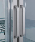Close-up of handles on Heavy Duty Commercial Reach In Freezer With Dual Glass Doors And Rock Solid Stainless Build.