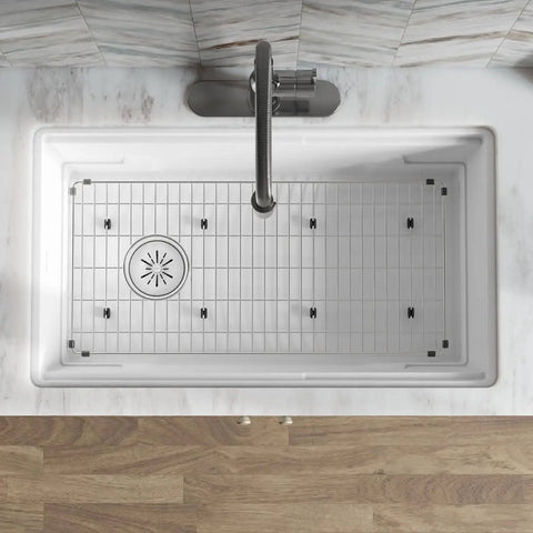 Top view of sink setup with Quartz Color Matched Disposer Flange With Removable Basket Strainer And Rubber Stopper 3-1/2 Inch