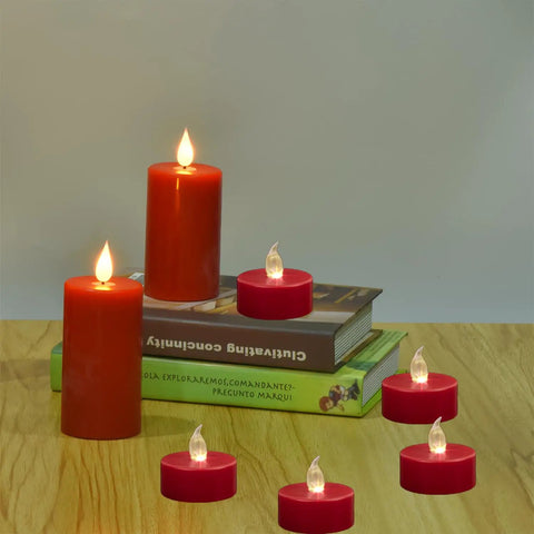 Red flameless LED candles with flickering flame on a wooden tabletop, three pack flameless battery operated LED candles with embedded starlight string lights. 