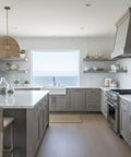 Modern kitchen with light wood cabinetry and ocean view, featuring Heavy Duty Reactive Wood Stain In Light Oaking Creates Slick Sun Washed Finish.