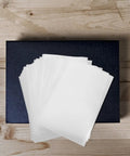 EPE Foam Pouches For Packing Dishes And Protecting Electronics 200 White Cushion Wrapping Bags on table