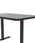 30 By 60 Inch Rectangular Cafe And Break Room Table With Gray Granite Top And Black T Bases Sturdy Steel Columns Nylon Leveling Guides For Easy Setup Durable High Pressure Laminate Made In USA close-up view of tabletop.