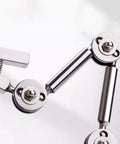 Close-up of Universal Welding Fixture With Clamp Rebound Jig and Third Hand Soldering Station joints, metal components visible.