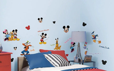 Mickey And Friends Peel And Stick Wall Decals Set Of 30, Easy To Apply, Removable And Repositionable Vinyl Stickers For Kids Room Decor That Pops, Varying Sizes From 1.5 By 1.75 Inches To 10 By 11.25 Inches, Made In The USA, No Residue displayed on a kids' room wall