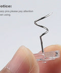 Close-up of a stainless steel twist pin with clear rose head for Fifty Piece Upholstery Twist Pins Featuring Slick Clear Rose Heads And Compact Storage Box Rock Solid Fabric Fasteners No Hassle Setup Heavy Duty Gear Dang Easy To Use For Bed Skirts And Sofas.