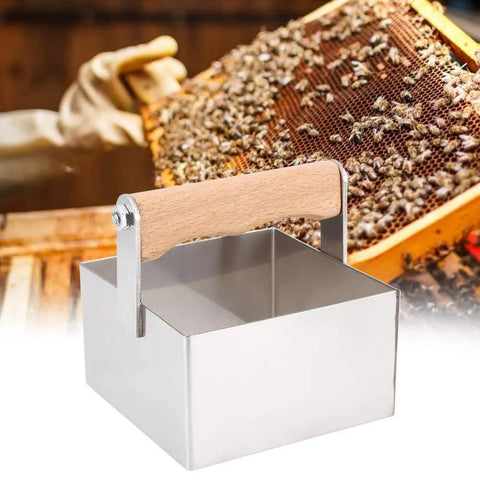 Stainless Steel Honeycomb Cutter For Beekeeping with wooden handle next to honeycomb frame in use, ideal for clean cuts.