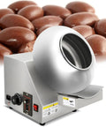 Smooth Operator Sugar Coating Machine With Steady Heat Controls For Shiny Candy Polish And Fast Tablet Glazing in silver, features a rotating drum.