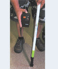 Person using S4-P And Mini-Ligno SD/C Moisture Meter And Mold Detector Kit with E14-M Electrode on a carpeted floor