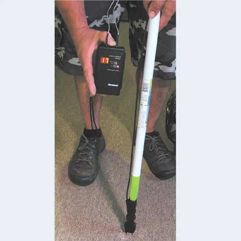 Person using S4-P And Mini-Ligno SD/C Moisture Meter And Mold Detector Kit with E14-M Electrode on a carpeted floor