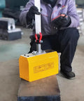 Heavy Duty Automatic Magnetic Lifter 2200 Lbs Capacity Plunger Operated Design in use lifting metal block.